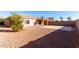 Large backyard with gravel and concrete patio at 4233 E Colonial Dr, Chandler, AZ 85249