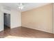 Spacious bedroom with wood flooring and neutral wall color at 4233 E Colonial Dr, Chandler, AZ 85249