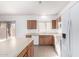 Spacious kitchen with an island, light-colored cabinetry, and tile flooring at 4233 E Colonial Dr, Chandler, AZ 85249