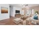 Spacious living room featuring hardwood floors and ample natural light at 4233 E Colonial Dr, Chandler, AZ 85249