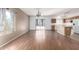 Spacious living room with laminate floors and a chandelier at 4233 E Colonial Dr, Chandler, AZ 85249