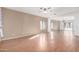 Living area with laminate wood floors and a ceiling fan at 4233 E Colonial Dr, Chandler, AZ 85249