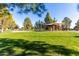 Expansive park with playground, shaded areas, and open green space at 4233 E Colonial Dr, Chandler, AZ 85249