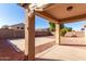Covered patio with concrete slab and gravel yard at 4233 E Colonial Dr, Chandler, AZ 85249