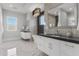 Spa-like bathroom with marble finishes and soaking tub at 6237 N 5Th Pl, Phoenix, AZ 85012