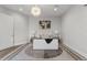 Cozy bedroom with a queen-size bed and neutral decor at 6237 N 5Th Pl, Phoenix, AZ 85012