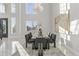 Sunlit dining room featuring a long table and modern decor at 6237 N 5Th Pl, Phoenix, AZ 85012