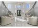 Elegant entryway with a double door, high ceilings, and a grand staircase at 6237 N 5Th Pl, Phoenix, AZ 85012