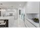 Luxury kitchen with marble flooring and white cabinetry at 6237 N 5Th Pl, Phoenix, AZ 85012