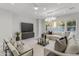 Spacious living room with sectional sofa and large TV at 6237 N 5Th Pl, Phoenix, AZ 85012