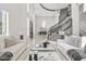 Open living area showcasing a grand staircase and luxurious seating at 6237 N 5Th Pl, Phoenix, AZ 85012