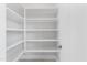 Bright white corner pantry with ample shelving at 6237 N 5Th Pl, Phoenix, AZ 85012