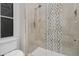 Bathroom with a frameless shower and mosaic tile detail at 6237 N 5Th Pl, Phoenix, AZ 85012