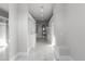 Bright walk-in closet with extensive storage and marble floors at 6237 N 5Th Pl, Phoenix, AZ 85012