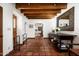 Spacious entryway with terracotta tile floors and wooden beams at 6617 N Central Ave, Phoenix, AZ 85012