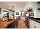 Gourmet kitchen features a large island, high-end appliances, and custom cabinetry at 6617 N Central Ave, Phoenix, AZ 85012