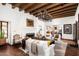 Elegant living room with fireplace, high ceilings, and large windows at 6617 N Central Ave, Phoenix, AZ 85012