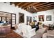 Spacious living room with hardwood floors and beautiful artwork at 6617 N Central Ave, Phoenix, AZ 85012