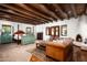 Large main bedroom with a fireplace and seating area at 6617 N Central Ave, Phoenix, AZ 85012