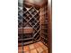 Impressive wine cellar with custom racking and ample storage for wine bottles at 6617 N Central Ave, Phoenix, AZ 85012