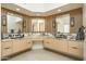 Modern bathroom with double vanity, marble countertops, and large mirrors at 7147 N 23Rd Pl, Phoenix, AZ 85020