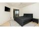 Modern bedroom with city views and a large TV at 7147 N 23Rd Pl, Phoenix, AZ 85020