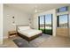 Bright bedroom with wood flooring and city views at 7147 N 23Rd Pl, Phoenix, AZ 85020