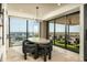 Elegant dining area with city views and access to a balcony at 7147 N 23Rd Pl, Phoenix, AZ 85020