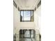 High-ceiling entryway with glass walls and modern light fixture at 7147 N 23Rd Pl, Phoenix, AZ 85020