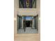 Elegant entryway with geometric tile floor and glass doors at 7147 N 23Rd Pl, Phoenix, AZ 85020