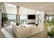 Living room boasts city views, fireplace, and large windows at 7147 N 23Rd Pl, Phoenix, AZ 85020