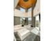 Open living area with high ceilings, modern chandelier, and city views at 7147 N 23Rd Pl, Phoenix, AZ 85020