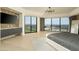 Main bedroom with city views, wood floors, and built-in media console at 7147 N 23Rd Pl, Phoenix, AZ 85020