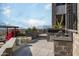 Outdoor patio with built-in grill, fire pit, and city views at 7147 N 23Rd Pl, Phoenix, AZ 85020