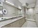 Modern bathroom with double vanity and glass shower at 7180 E Kierland Blvd # 1209, Scottsdale, AZ 85254