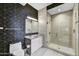 Contemporary bathroom with geometric tile and a walk-in shower at 7180 E Kierland Blvd # 1209, Scottsdale, AZ 85254