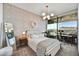 Stylish bedroom with city views and a comfortable bed at 7180 E Kierland Blvd # 1209, Scottsdale, AZ 85254