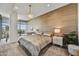 Main bedroom with wood-like wall and city views at 7180 E Kierland Blvd # 1209, Scottsdale, AZ 85254