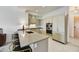 Modern kitchen with a breakfast bar and stainless steel appliances at 7180 E Kierland Blvd # 1209, Scottsdale, AZ 85254