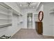 Spacious walk-in closet with ample shelving and hanging space at 7180 E Kierland Blvd # 1209, Scottsdale, AZ 85254