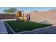 Artificial turf play area with playset at 7332 W Quail Track Dr, Peoria, AZ 85383