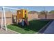 Backyard with playset and swings at 7332 W Quail Track Dr, Peoria, AZ 85383