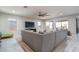 Spacious living room with sectional sofa and backyard access at 7332 W Quail Track Dr, Peoria, AZ 85383