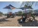 Modern playground with two play structures at 7332 W Quail Track Dr, Peoria, AZ 85383