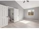 Spacious bedroom with plush carpet and an ensuite bathroom at 8908 W Loma Ln, Peoria, AZ 85345