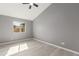 Bright bedroom with grey walls, wood-look floors, and a ceiling fan at 8908 W Loma Ln, Peoria, AZ 85345