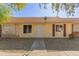 Condo with freshly painted exterior and new landscaping at 8908 W Loma Ln, Peoria, AZ 85345