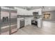 Modern kitchen with stainless steel appliances at 8908 W Loma Ln, Peoria, AZ 85345
