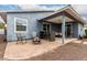 Relaxing backyard patio with covered seating and fire pit at 8938 N 15Th Ln, Phoenix, AZ 85021