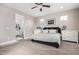 Main bedroom with king-size bed, ensuite bathroom access, and ample closet space at 8938 N 15Th Ln, Phoenix, AZ 85021